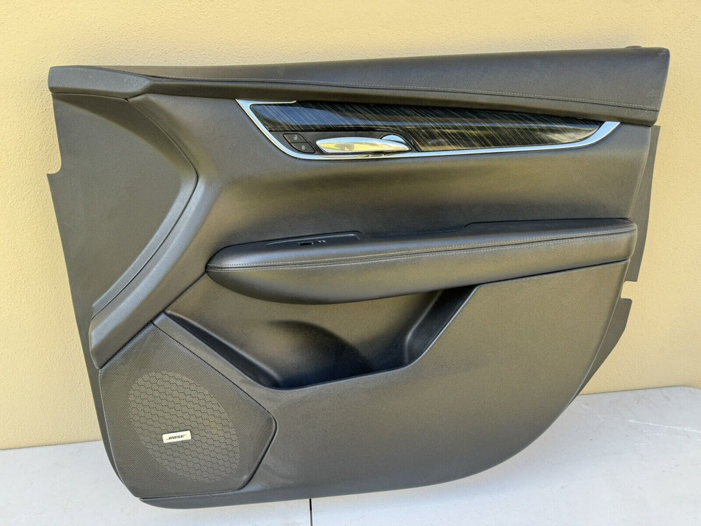 Right passenger side front door trim panel with window switch