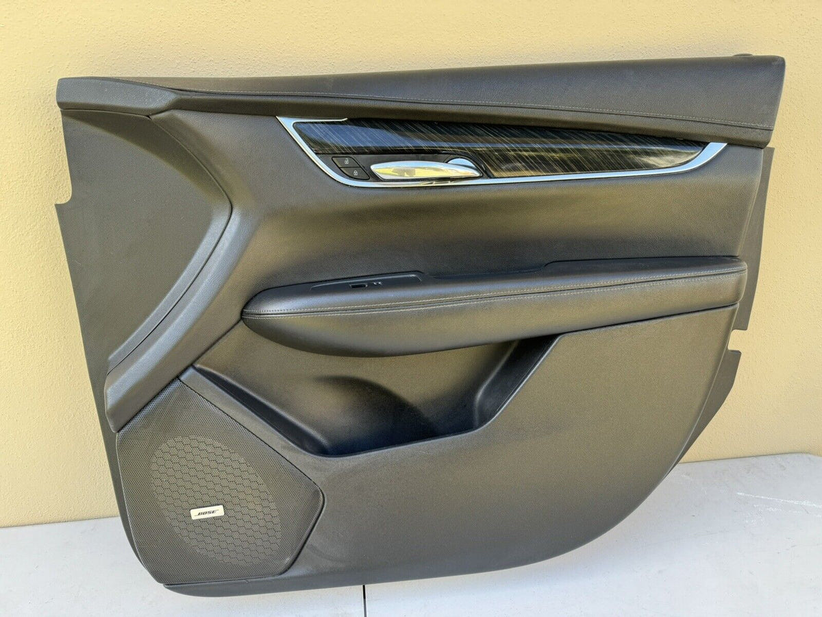 Right passenger side front door trim panel with window switch