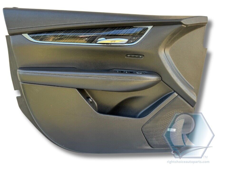 Left driver side front door trim panel with master window switch