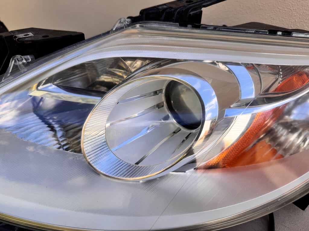 2010-2012 Mazda CX-9 Xenon HID Headlight Assembly PAIR w/ Upper Grille OEM