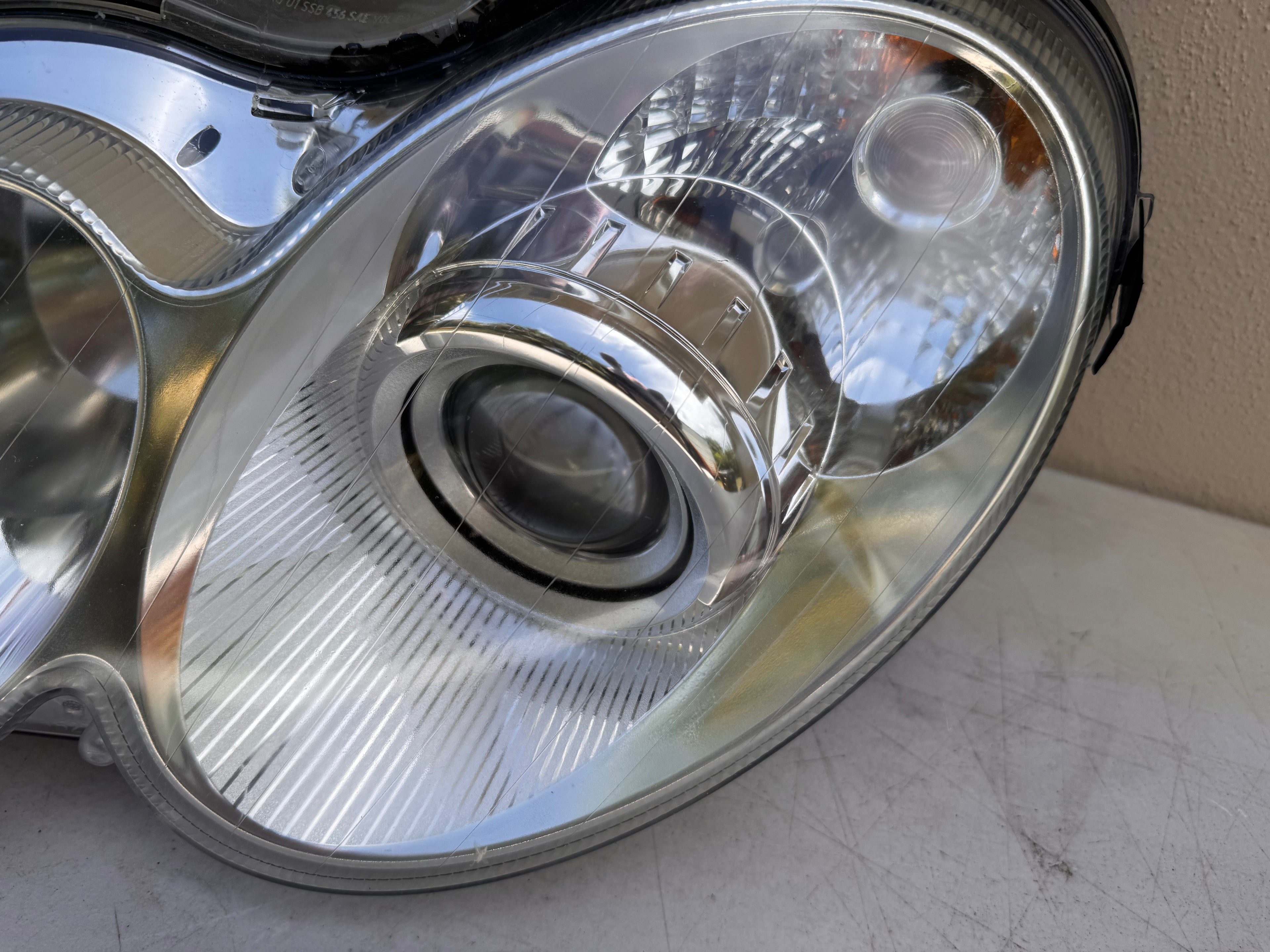 OEM Mercedes-Benz CLK W209 Bi-Xenon HID AFS Headlight Assembly Pair | 2003–2009 CLK320 CLK350 CLK500 CLK55 AMG