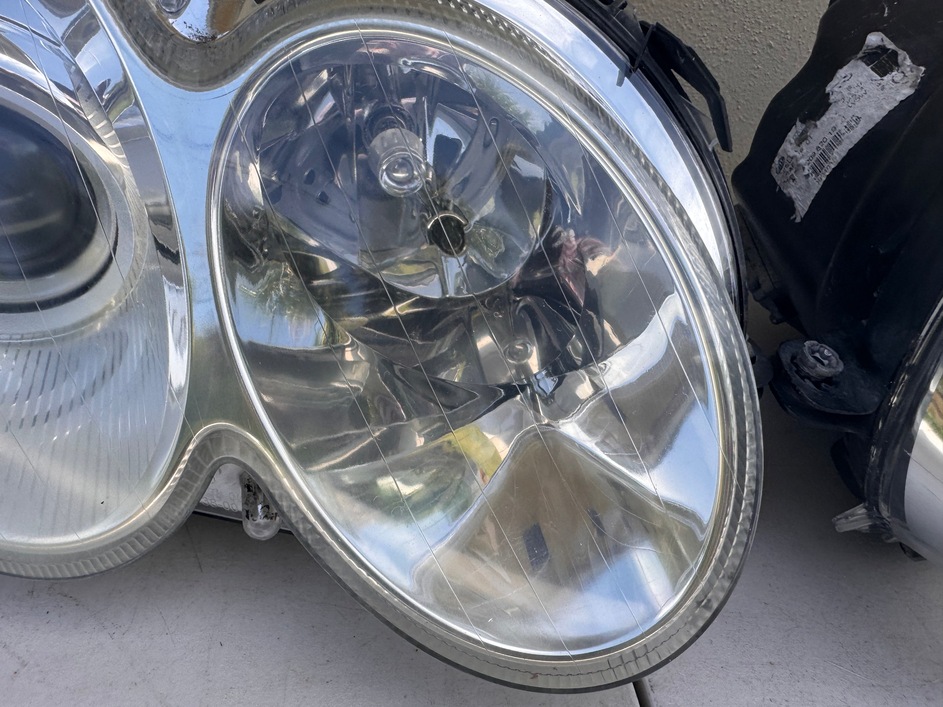 OEM Mercedes-Benz CLK W209 Bi-Xenon HID AFS Headlight Assembly Pair | 2003–2009 CLK320 CLK350 CLK500 CLK55 AMG