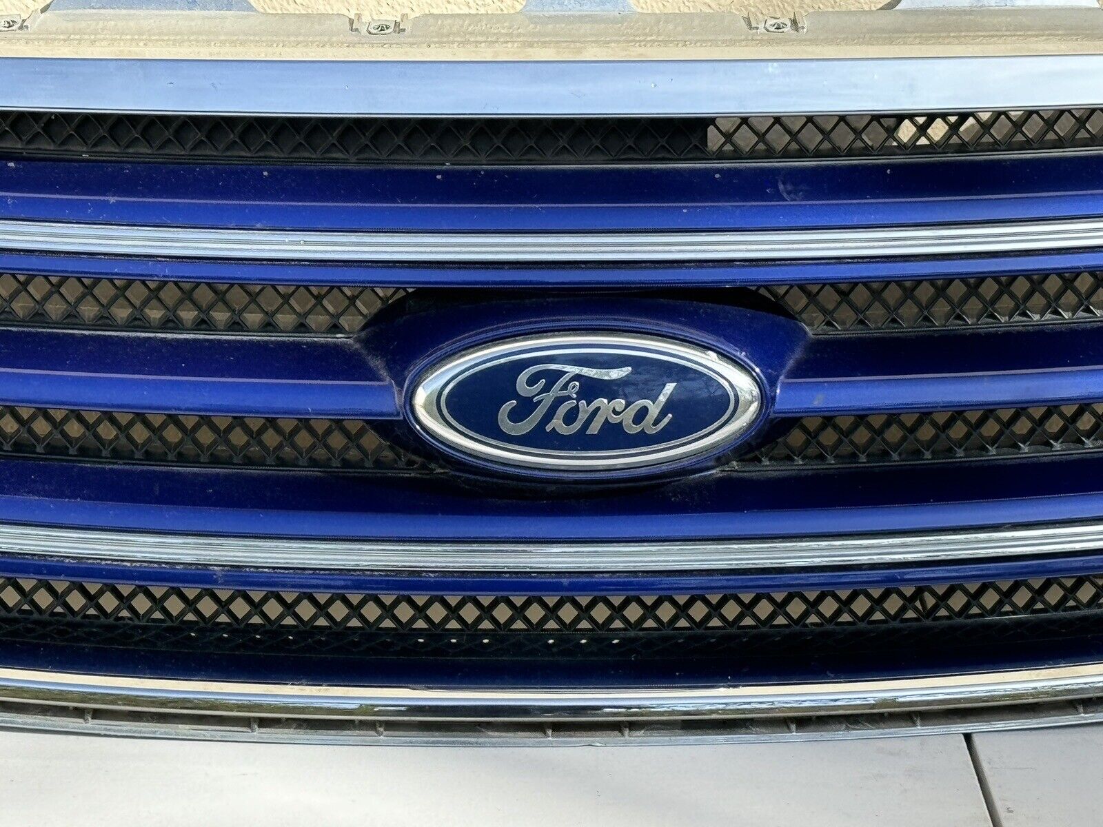 2013-2019 Ford Taurus Limited OEM Front Bumper Grille Blue & Chrome w/ Emblem